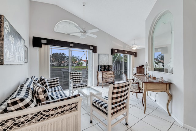 living room with ceiling fan, light tile patterned floors, and high vaulted ceiling