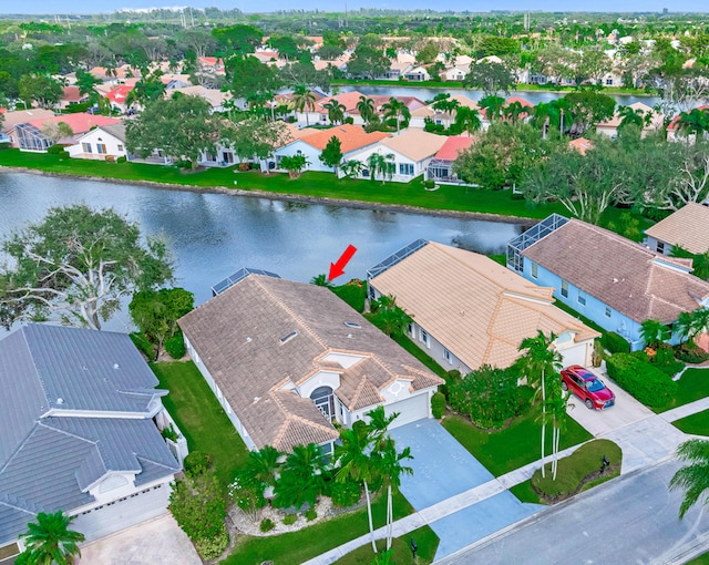 bird's eye view with a water view