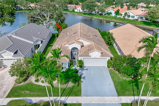 drone / aerial view featuring a water view