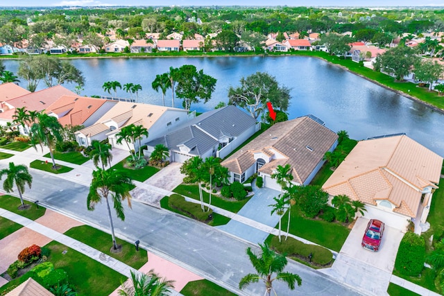 drone / aerial view with a water view