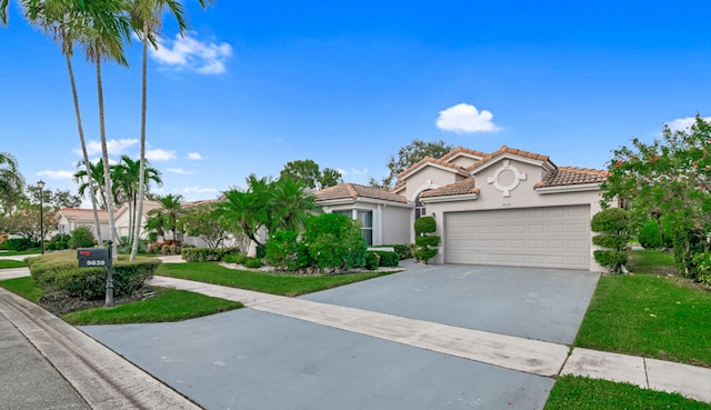 mediterranean / spanish-style house featuring a garage