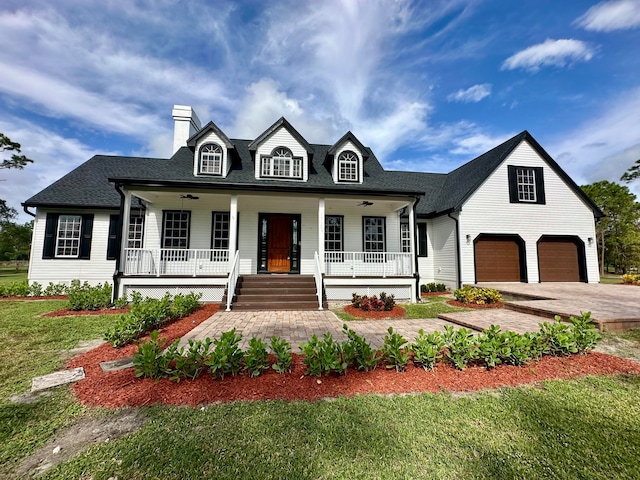 view of front of property with a porch and a front yard