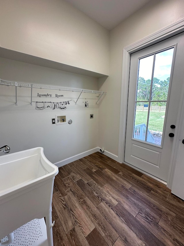 washroom featuring hookup for an electric dryer, washer hookup, hookup for a gas dryer, sink, and dark wood-type flooring