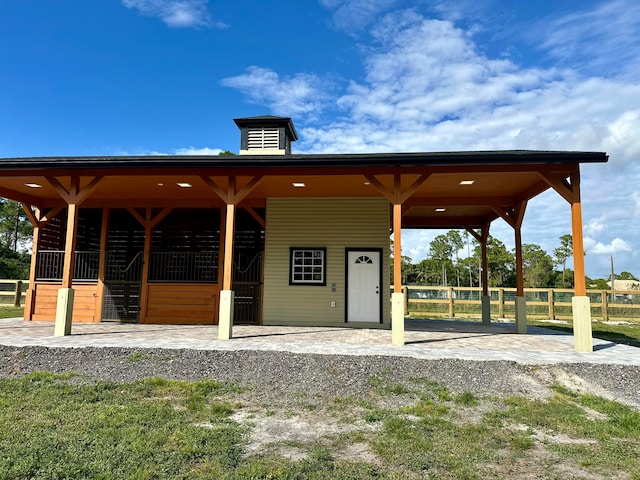 view of property's community with an outdoor structure