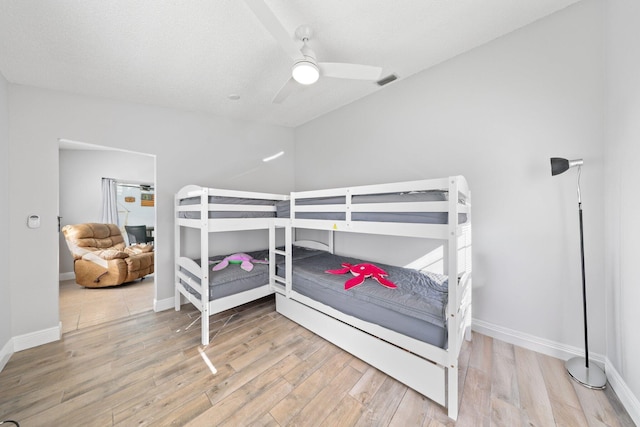 bedroom featuring hardwood / wood-style floors and ceiling fan