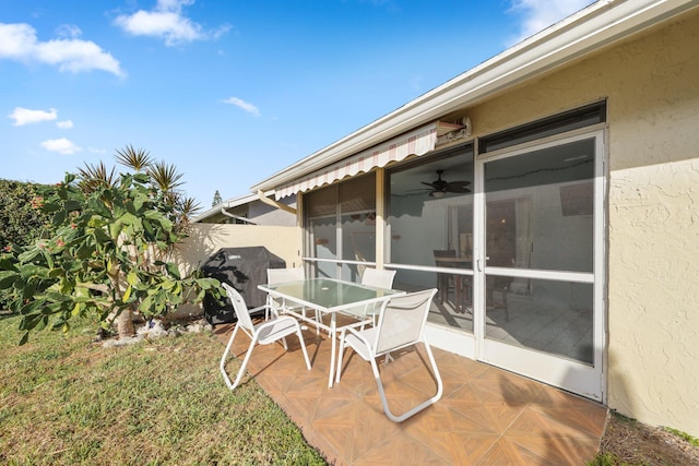 view of patio with a sunroom