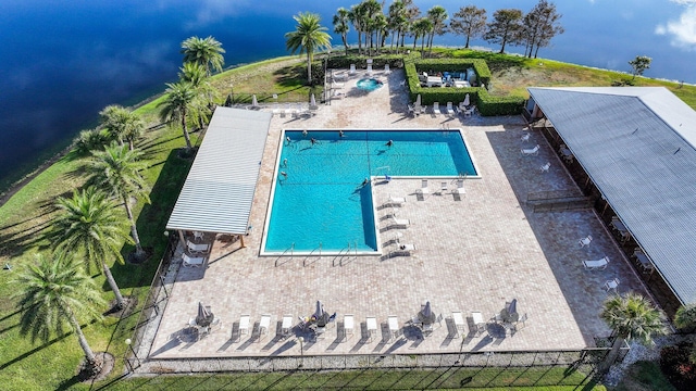 view of pool with a water view