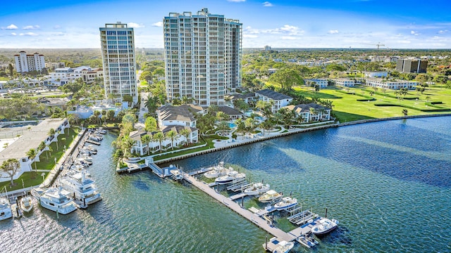 drone / aerial view featuring a water view and a city view