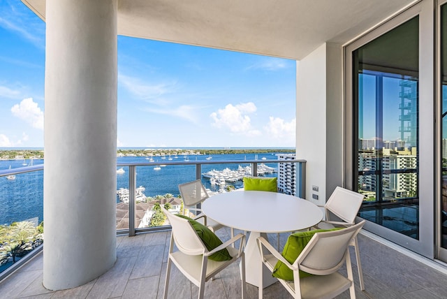 balcony featuring a water view