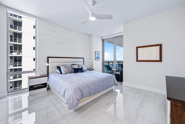 bedroom with a ceiling fan, access to outside, floor to ceiling windows, and baseboards