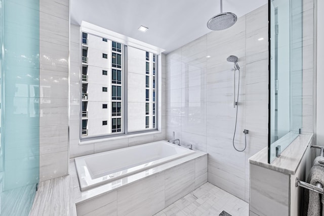 full bathroom featuring tiled shower and a garden tub