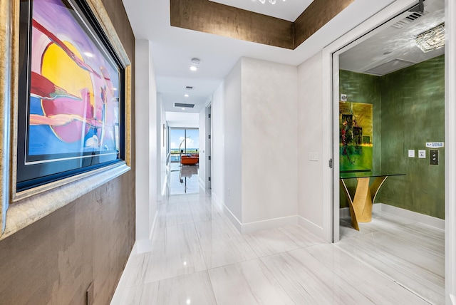 3 Water Club Way Unit 1401, North Palm Beach, FL 33408 - hallway featuring baseboards and tile patterned floors