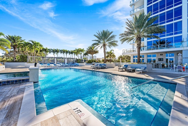 view of swimming pool featuring a patio