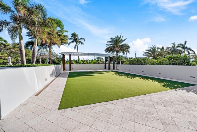 view of yard with a pergola