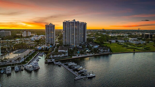 aerial view at dusk with a water view