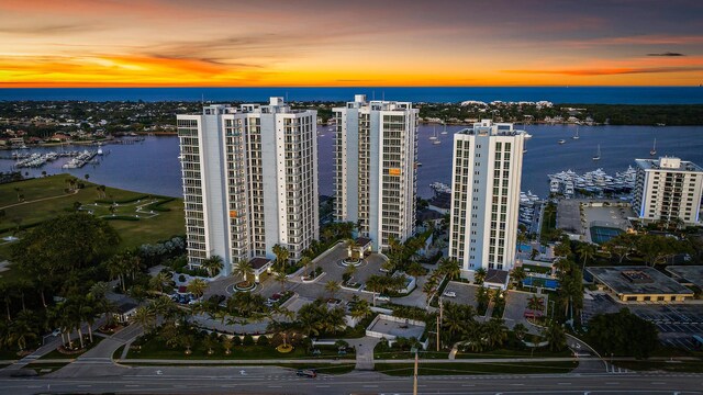 aerial view at dusk with a water view