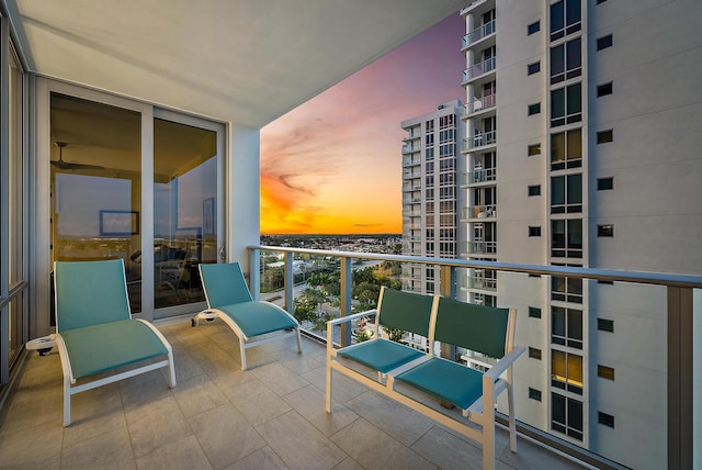 view of balcony at dusk