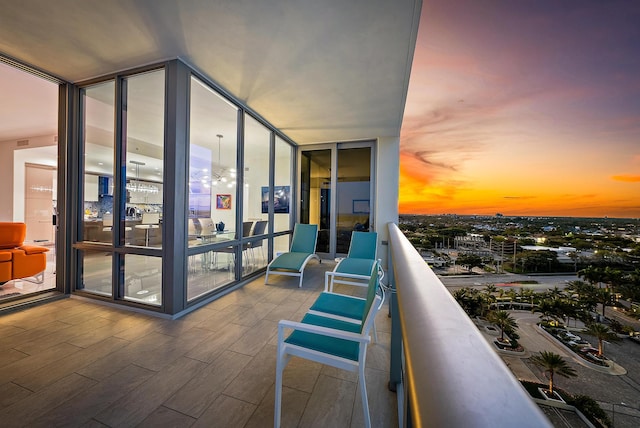 view of balcony at dusk