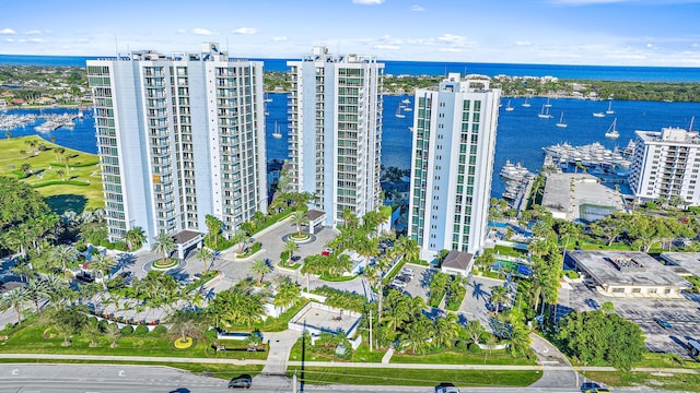 aerial view featuring a water view and a city view