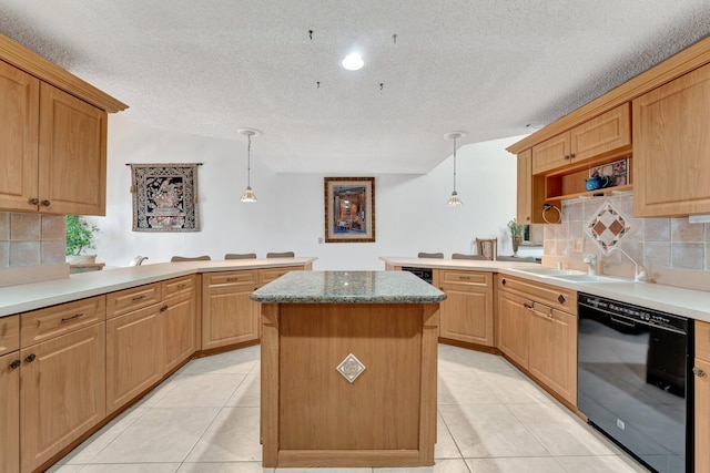 kitchen with dishwasher, tasteful backsplash, pendant lighting, and a textured ceiling