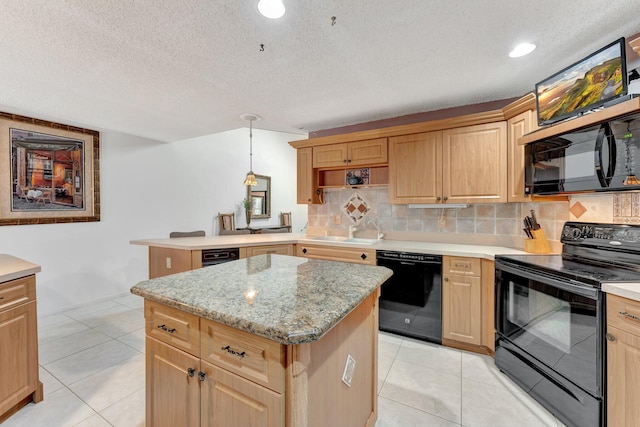 kitchen featuring hanging light fixtures, black appliances, a textured ceiling, and a kitchen island