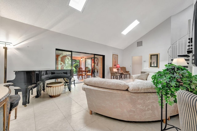 tiled living room featuring high vaulted ceiling