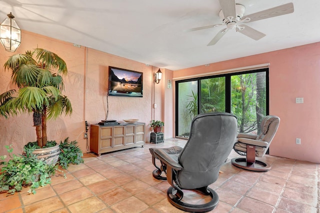 interior space featuring ceiling fan