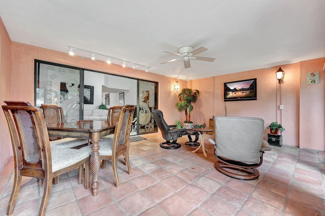 dining area with ceiling fan