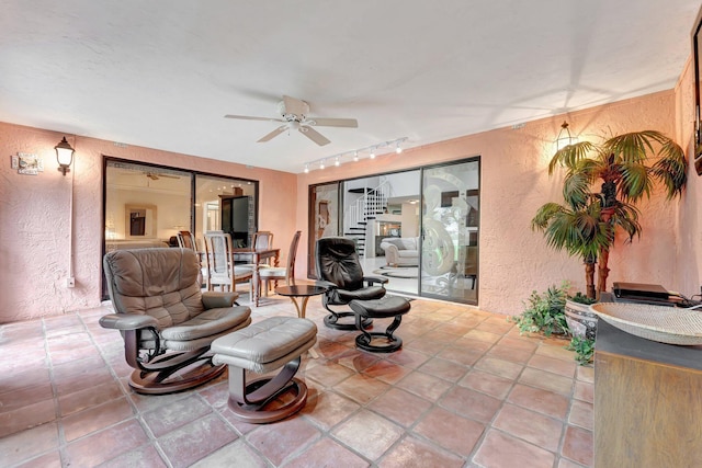 interior space featuring ceiling fan