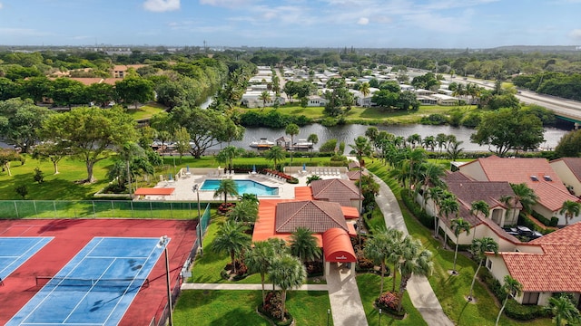 birds eye view of property with a water view