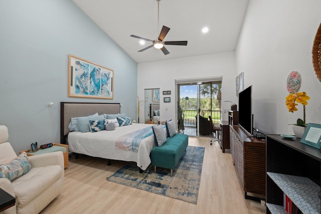 bedroom featuring access to exterior, ceiling fan, high vaulted ceiling, and light wood-type flooring