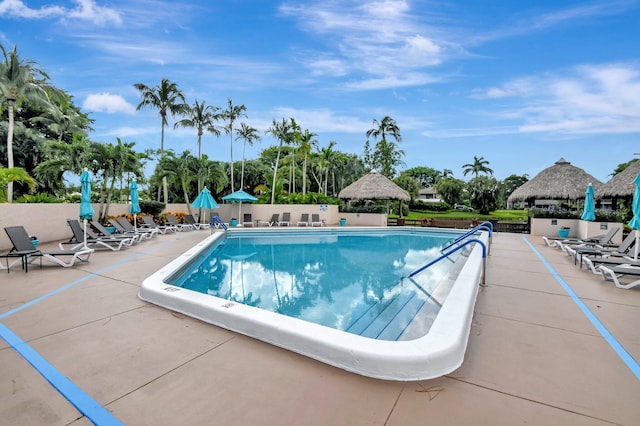 view of pool with a patio and a gazebo