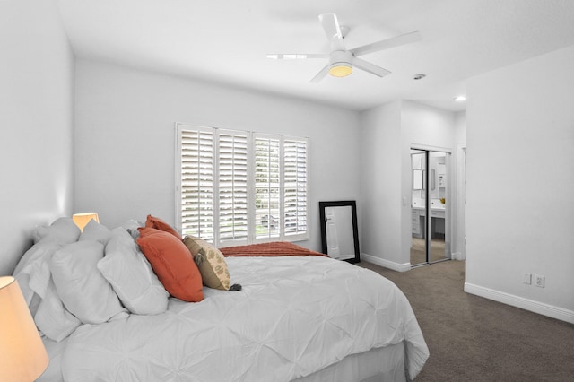 carpeted bedroom with ceiling fan and a closet