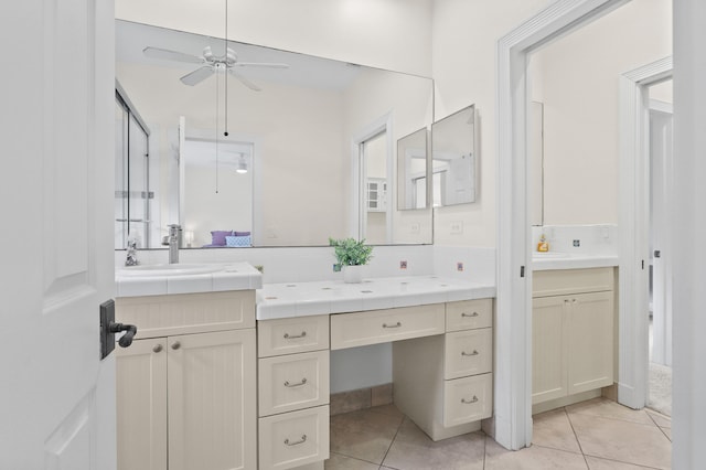 bathroom with vanity, tile patterned flooring, and ceiling fan