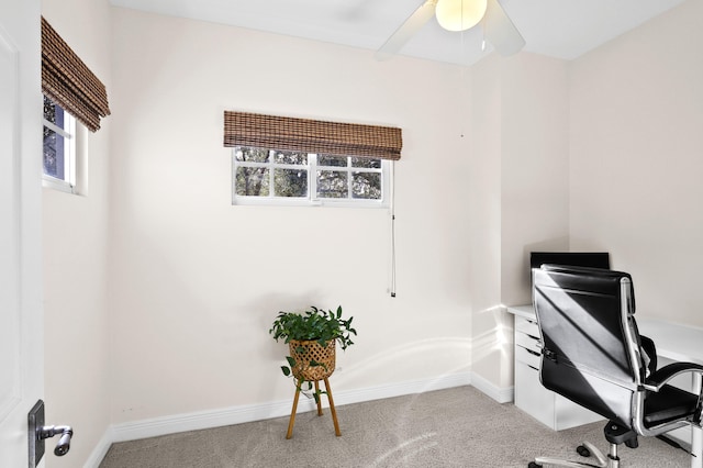 home office featuring carpet floors and ceiling fan