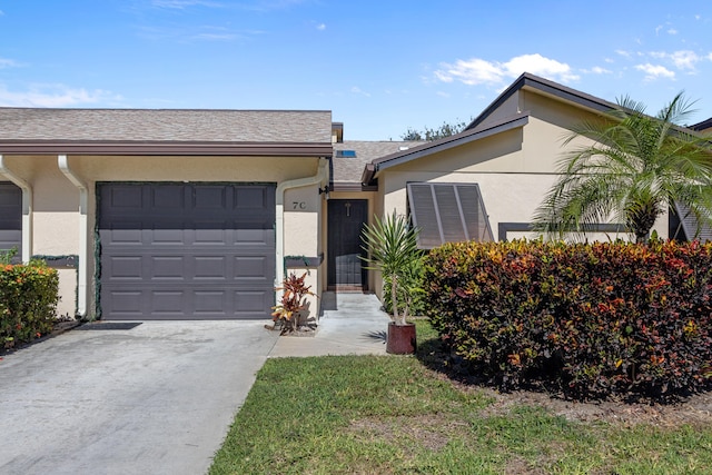 single story home featuring a garage