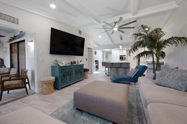 living room with lofted ceiling with beams, ceiling fan, and ornamental molding