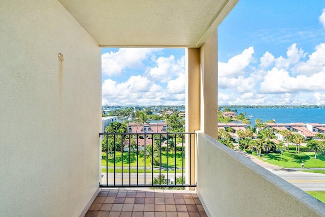 balcony featuring a water view