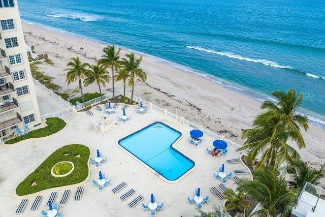 aerial view with a view of the beach and a water view