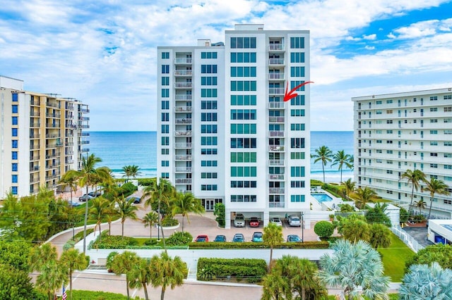 view of building exterior with a water view