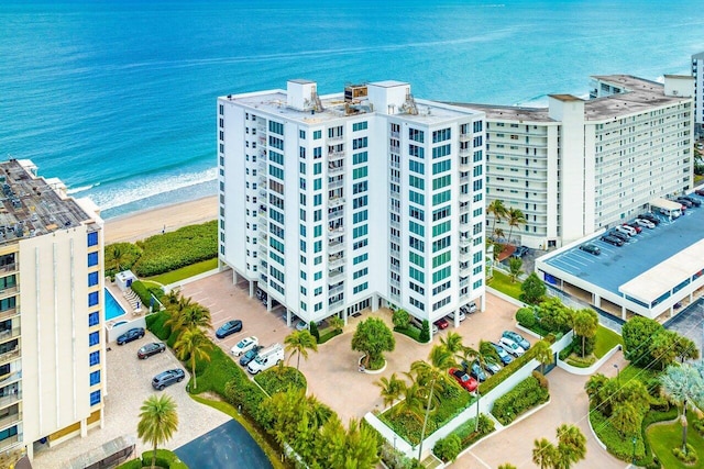 aerial view with a view of the beach and a water view