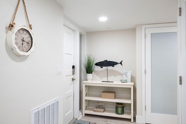 doorway to outside featuring light hardwood / wood-style floors