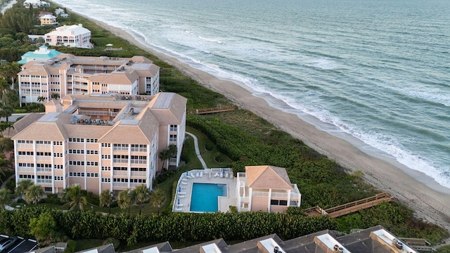 bird's eye view with a view of the beach and a water view