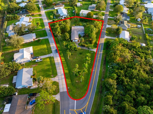 single story home with a front lawn and a garage