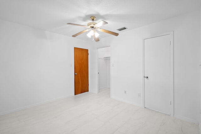 unfurnished bedroom with ceiling fan