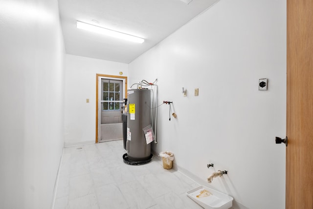 utility room featuring water heater