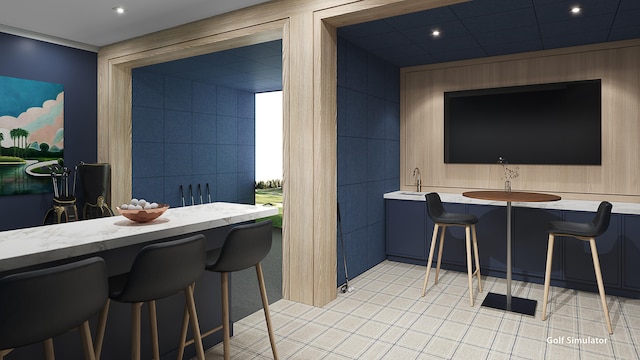 kitchen with tile walls and a breakfast bar