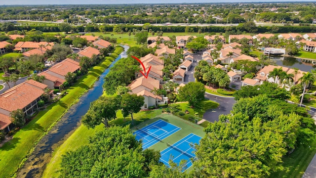 bird's eye view with a water view