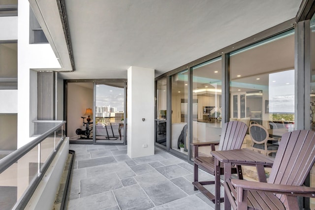 view of patio / terrace with a balcony