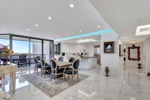 dining area with expansive windows